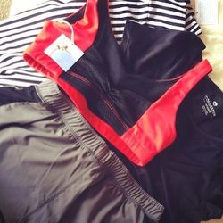 Going through a pile of new fitness fashion pieces from brands I have yet to try. The red sports bra from <b>Onzie</b> looks like a winner, but I’ll have to see how it holds up during a sweaty yoga class this week.