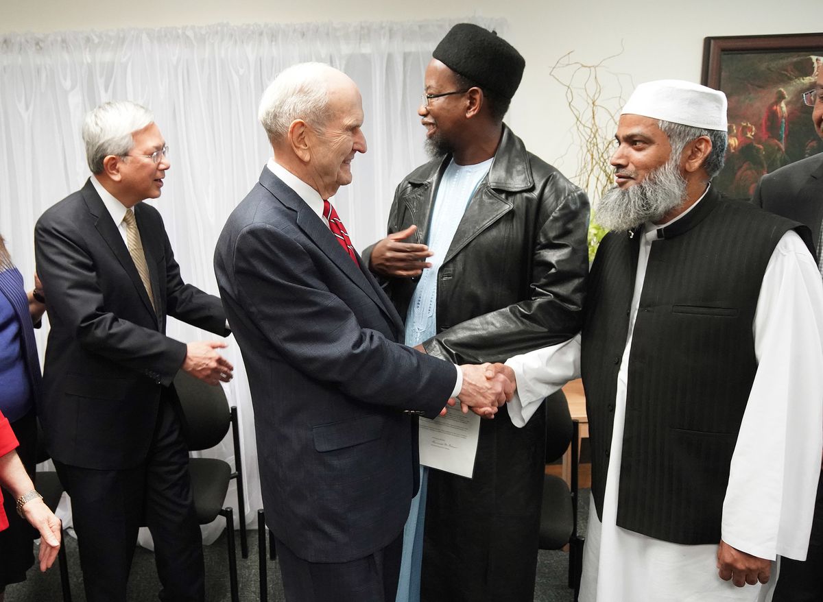 President Russell M. Nelson of The Church of Jesus Christ of Latter-day Saints greets Sheik Mohammad Amir and Elder Gerrit W. Gong, of The Church of Jesus Christ of Latter-day Saints’ Quorum of the Twelve Apostles, shakes hands with Dr. Mustafa Farouk in 