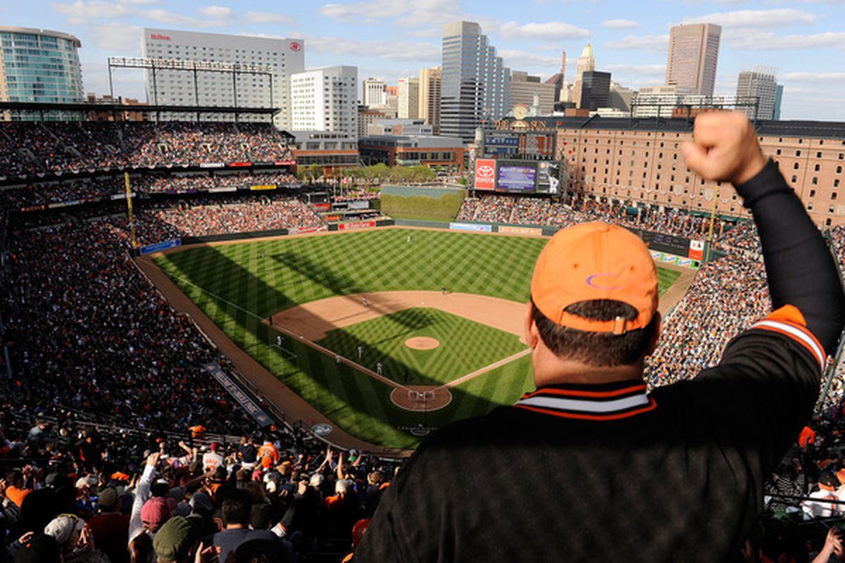 BALTIMORE - APRIL 09:  Fans cheer during the game between the Baltimore Orioles and the Toronto Blue Jays on Opening Day at Camden Yards on April 9, 2010 in Baltimore, Maryland.  (Photo by Greg Fiume/Getty Images)
