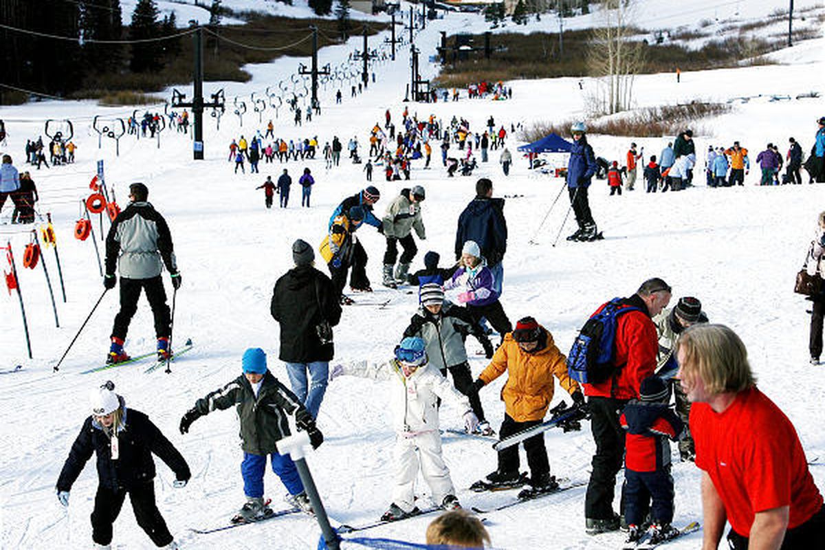 Hundreds of students learn the finer points of skiing at the Deseret Morning News Ski School at Alta in November 2006.