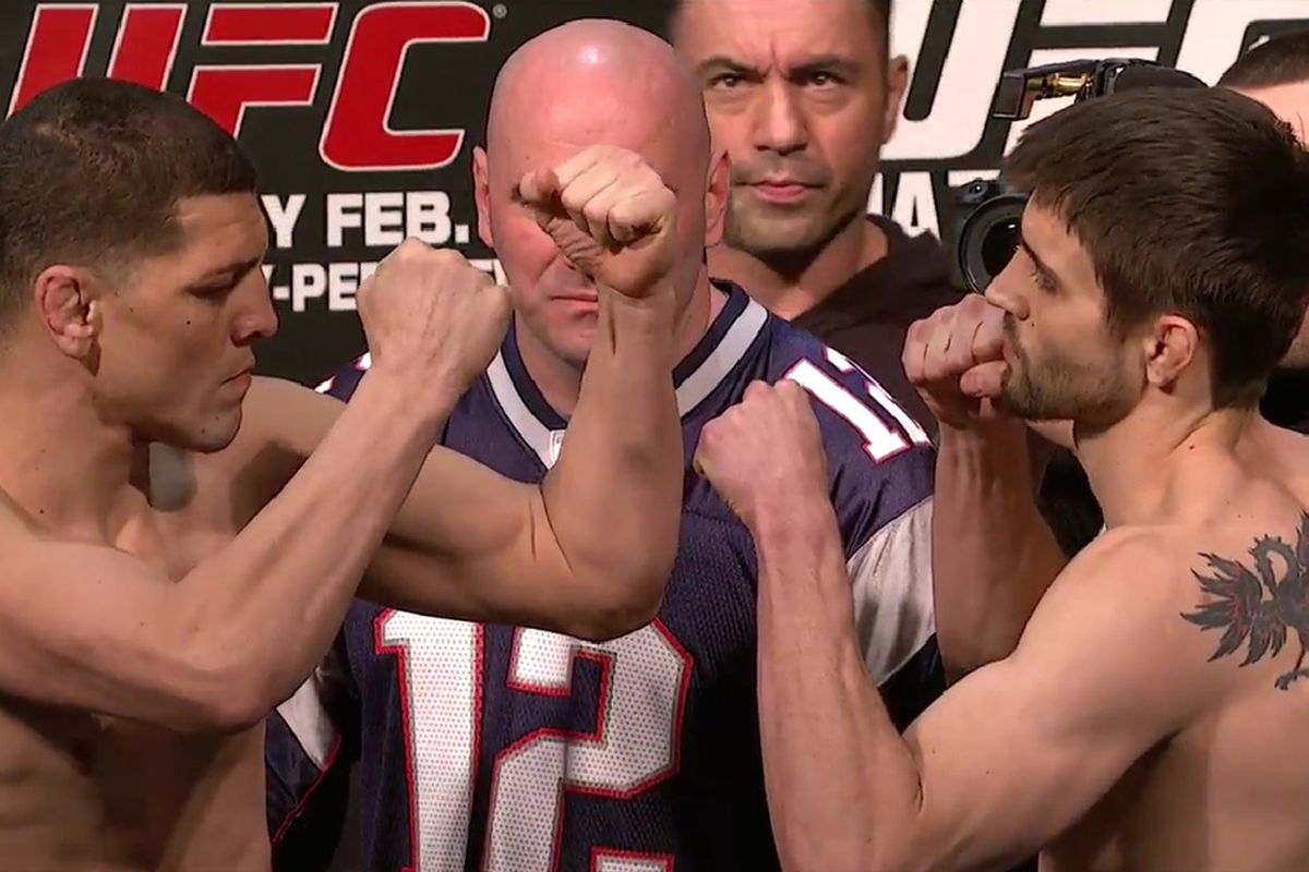 Nick Diaz (left) vs. Carlos Condit (right) staredown at the UFC 143 weigh-ins that took place today (Fri., Feb. 3, 2012) at the Mandalay Bay Events Center in Las Vegas, Nevada. 
