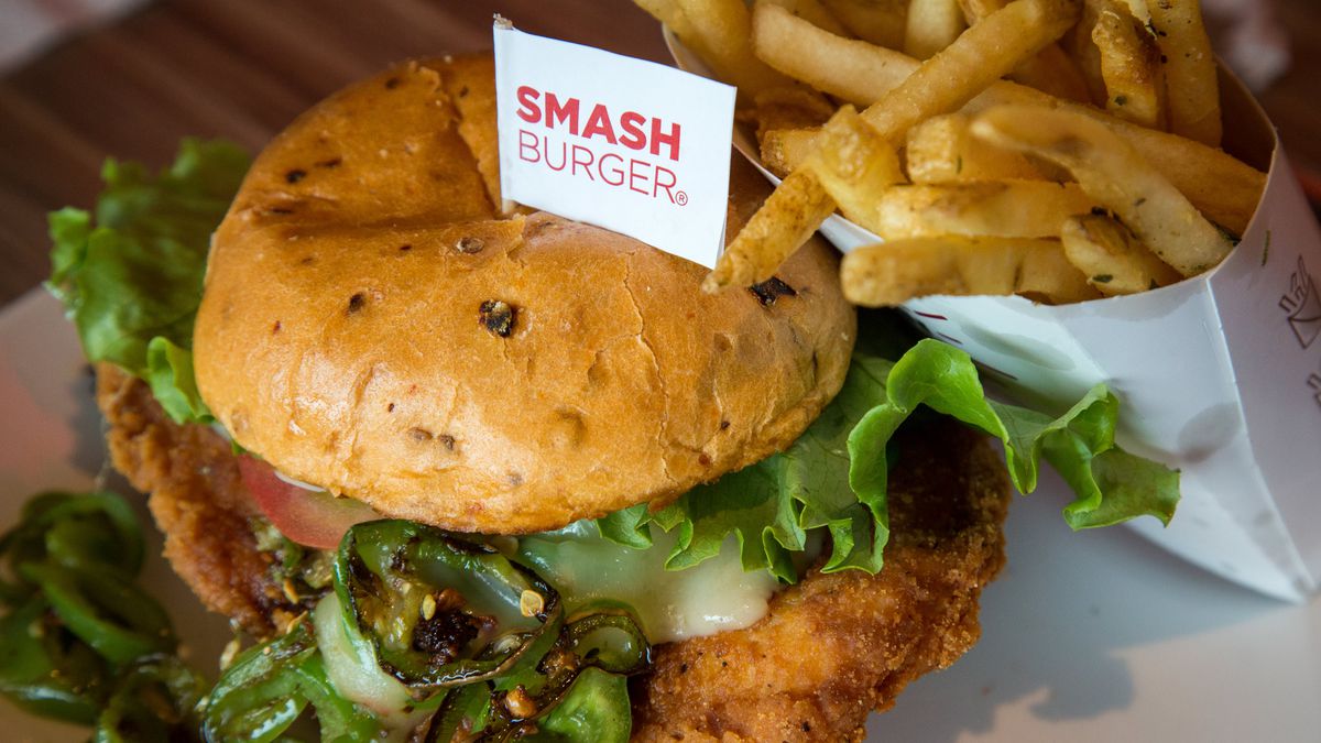 A chicken sandwich and fries from SmashBurger