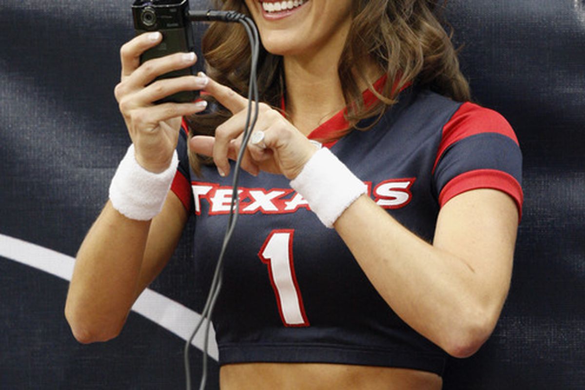 She just got the news that they'll be using artificial turf at Reliant.
