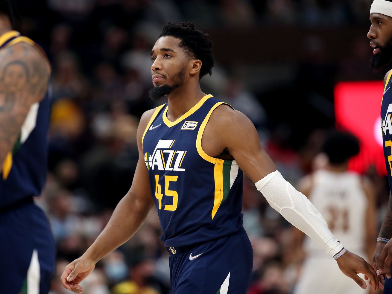 Utah Jazz guard Donovan Mitchell (45) shows frustration as he walks to the bench after losing the ball and committing a foul as the Utah Jazz and the Cleveland Cavaliers play an NBA basketball game at Vivint Arena in Salt Lake City on Wednesday, Jan. 12, 2022. Cavs won 111-91.