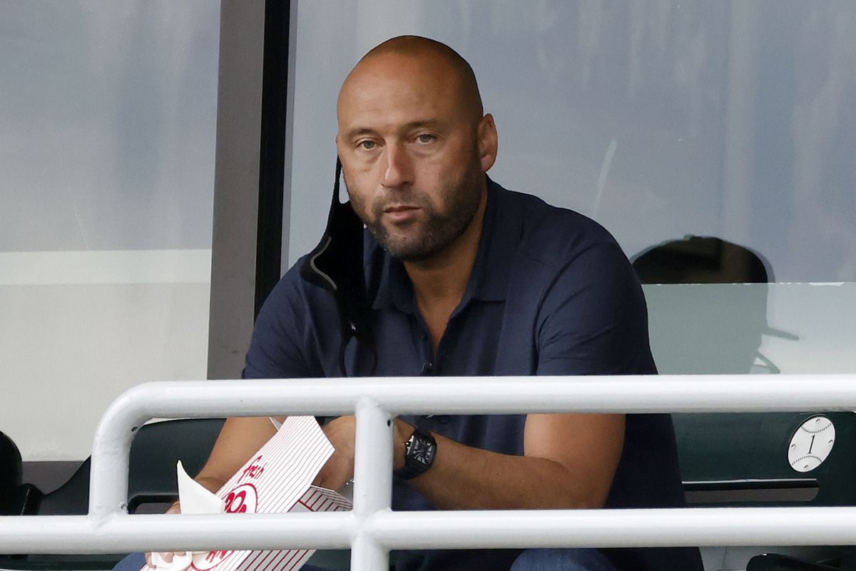 Miami Marlins chief executive officer Derek Jeter watches the game between the Miami Marlins and the Washington Nationals from a suite during a spring training game at Roger Dean Chevrolet Stadium