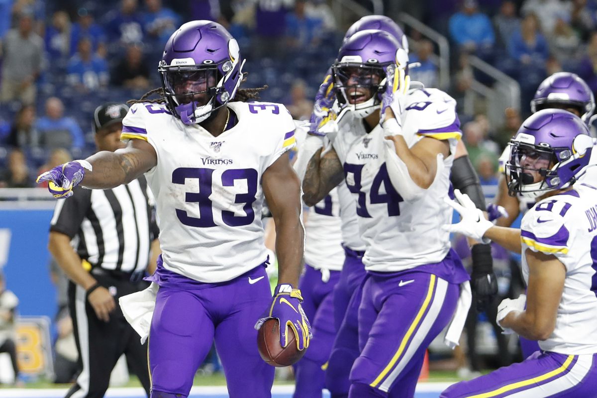 Minnesota Vikings running back Dalvin Cook celebrates with teammates after scoring a touchdown during the fourth quarter against the Detroit Lions at Ford Field.
