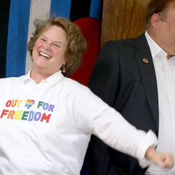Karen McCreary, executive director of the American Civil Liberties Union of Utah, enters a press conference with a cheer with Utah Sen. Jim Dabakis, D-Salt Lake City, at the Utah Pride Center in Salt Lake City on Friday, June 26, 2015. In a landmark opinion, the Supreme Court ruled Friday that states cannot ban same-sex marriage, handing gay rights advocates their biggest victory yet. 