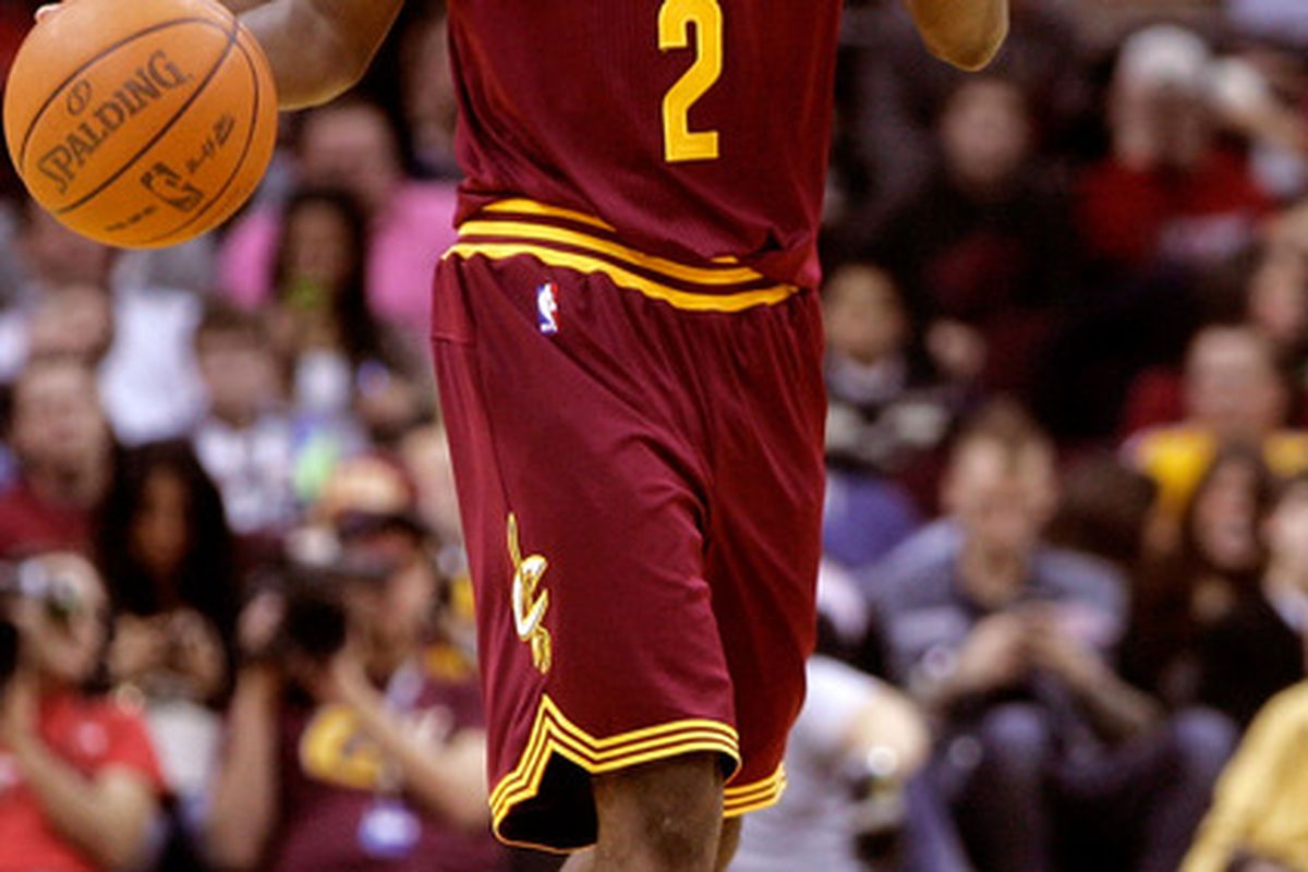 Kyrie Irving #2 of the Cleveland Cavaliers brings the ball up court against the Toronto Raptors during the season opener at Quicken Loans Arena on December 26, 2011 in Cleveland, Ohio. (Photo by Mike Lawrie/Getty Images)