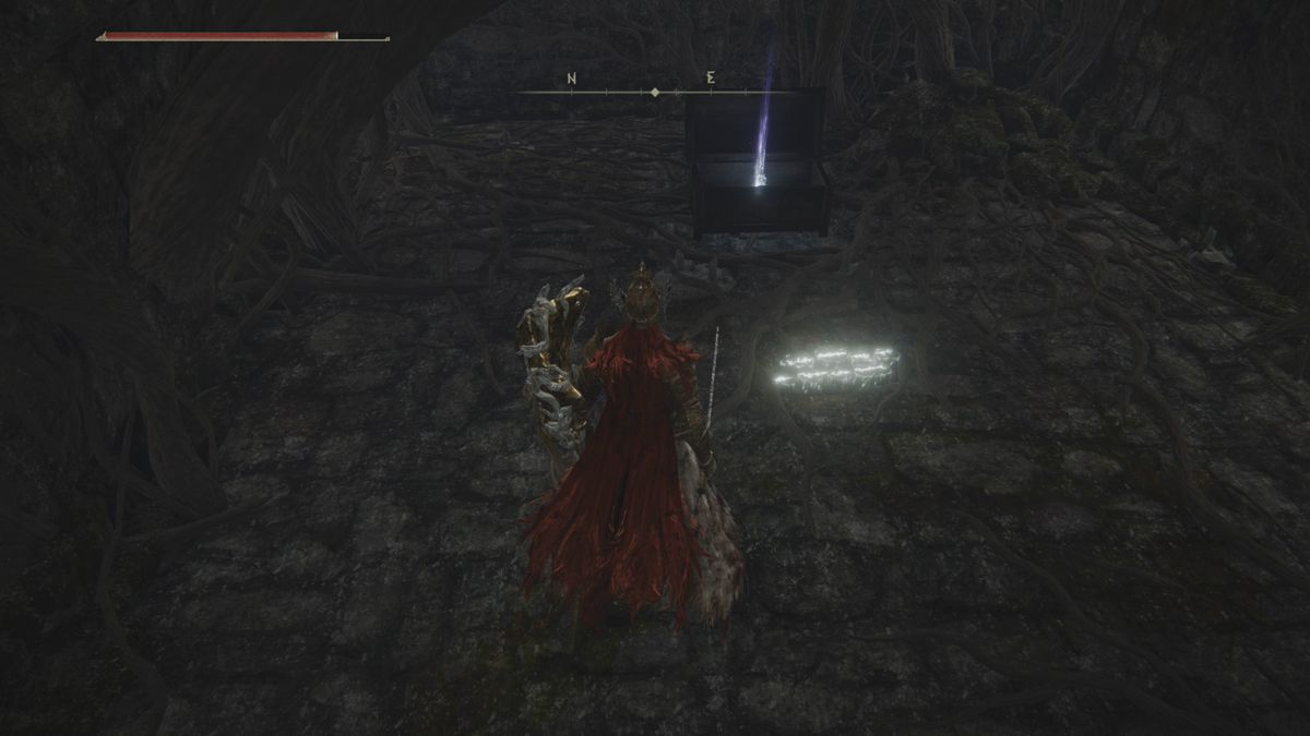 Elden Ring player approaching a chest containing the Two Finger Legacy in an underground chamber in the Purified Ruins 