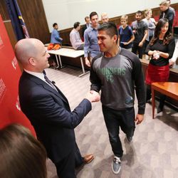 Independent presidential candidate Evan McMullin shakes hands with Alex Nunez at the University of Utah's Hinckley Institute in Salt Lake City on Wednesday, Nov. 2, 2016.