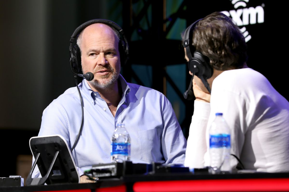 Journalist Rich Eisen and SiriusXM host, Chris “Mad Dog” Russo speak onstage during day 1 with SiriusXM at Super Bowl LIV on January 29, 2020 in Miami, Florida.
