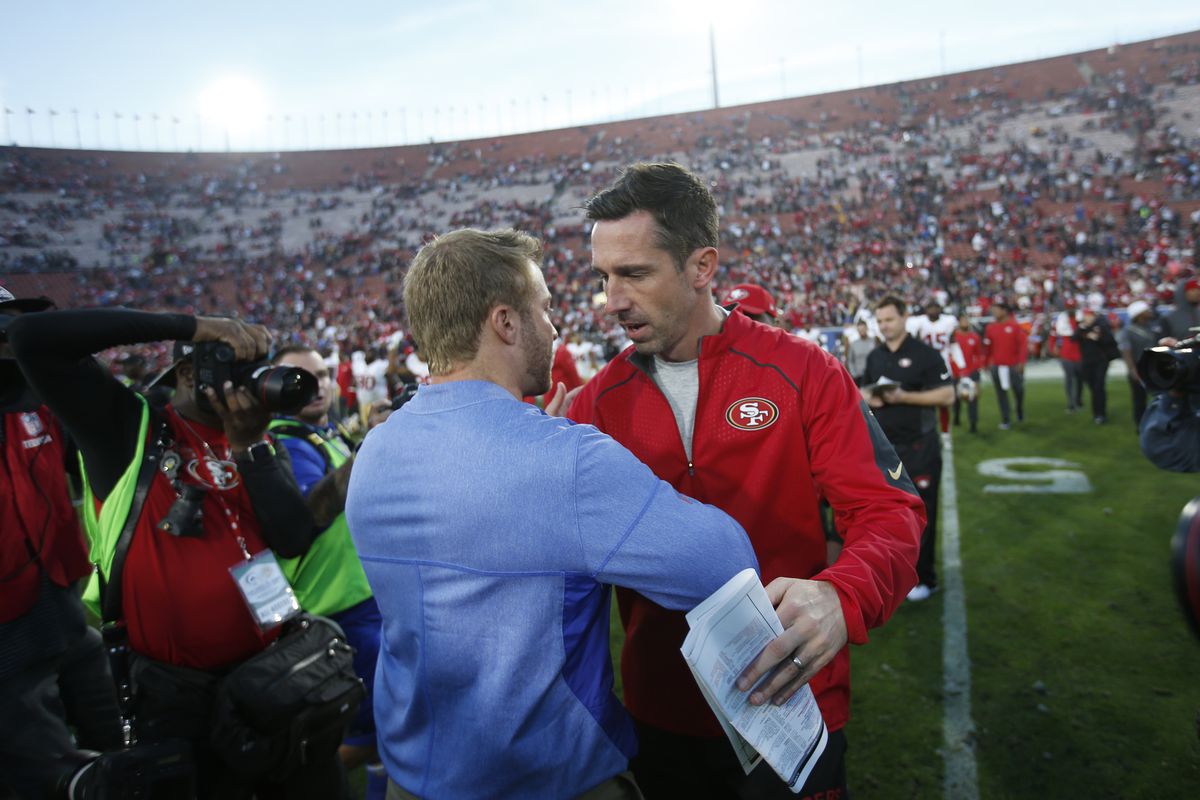 49ers head coach Kyle Shanahan and Rams head coach Sean McVay meet in the middle of the field after their December 30, 2018 matchup at the Los Angeles Coliseum.