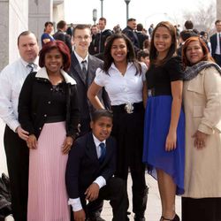 The Gore family from the Dominican Republic leaving the Sunday morning session of the 183rd Annual General Conference of The Church of Jesus Christ of Latter-Day Saints Sunday, April 7, 2013.