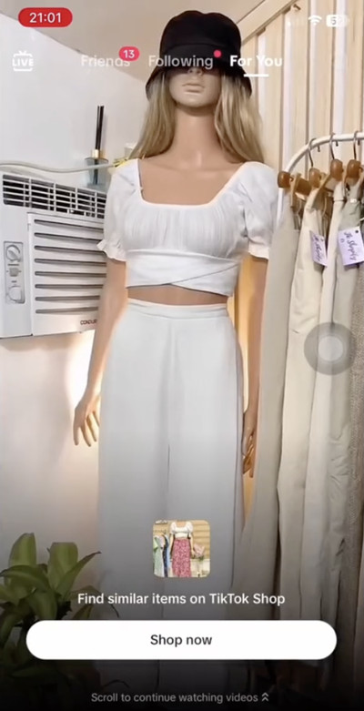 Screenshot of TikTok video showing mannequin with “find similar items on tiktok shop” shown below it.