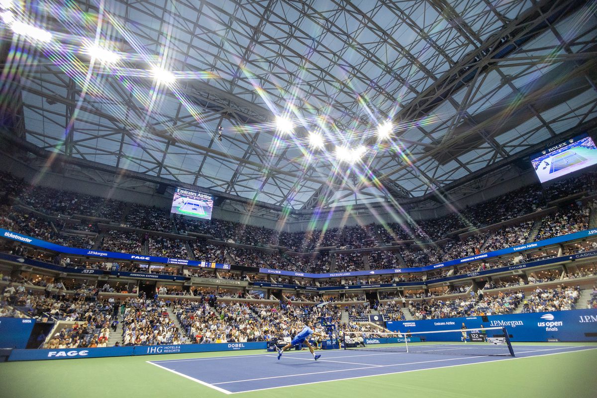 A general view as Novak Djokovic of Serbia as he plays a shot at the net during his match against Daniil Medvedev of Russia in the Men’s Singles Final on a packed Arthur Ashe Stadium with the roof closed during the US Open Tennis Championship 2023 at the USTA National Tennis Centre on September 10th, 2023 in Flushing, Queens, New York City.