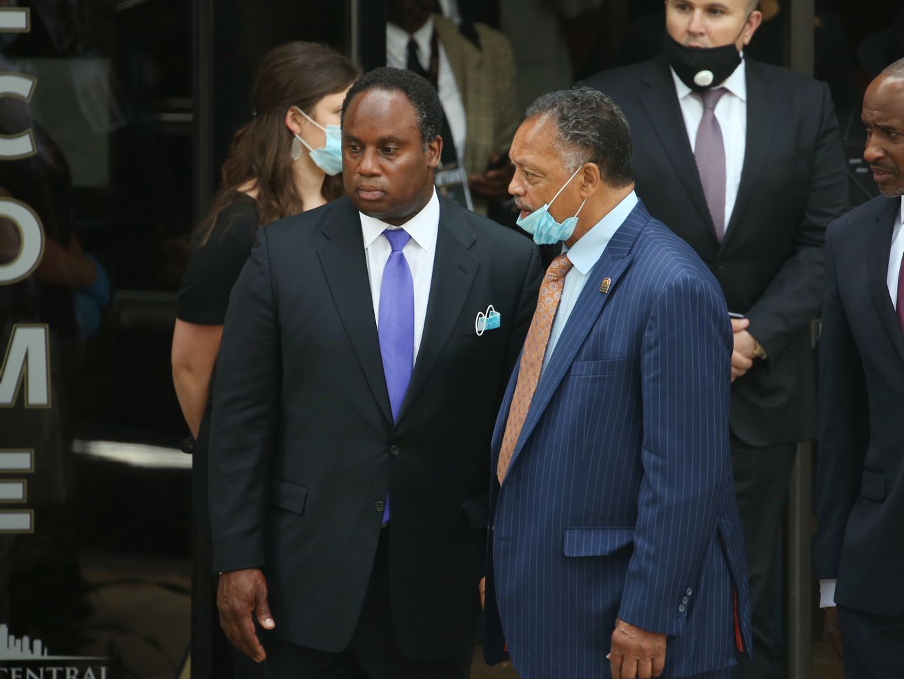 The Rev. Jesse Jackson leaves the Trask Worship Center with his son Jonathan following a memorial service for George Floyd in Minneapolis in June 2020.