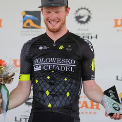 Tour of Utah Stage 4 winner John Murphy, an American with Holowesko Citadel, celebrates on the podium in South Jordan on Thursday, Aug. 3, 2017.