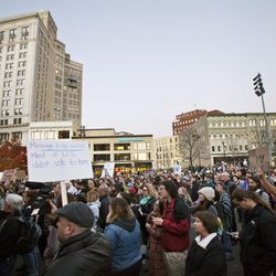 Protesters gather at Rosa Parks Circle in Grand Rapids, Mich.,  Thursday, Nov. 10, 2016, in opposition of Donald Trump's presidential election victory. 