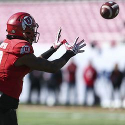 Wide receiver Bryan Thompson (19) catches a pass during the University of Utah scrimmage at Rice-Eccles Stadium in Salt Lake City on Saturday, March 30, 2019.