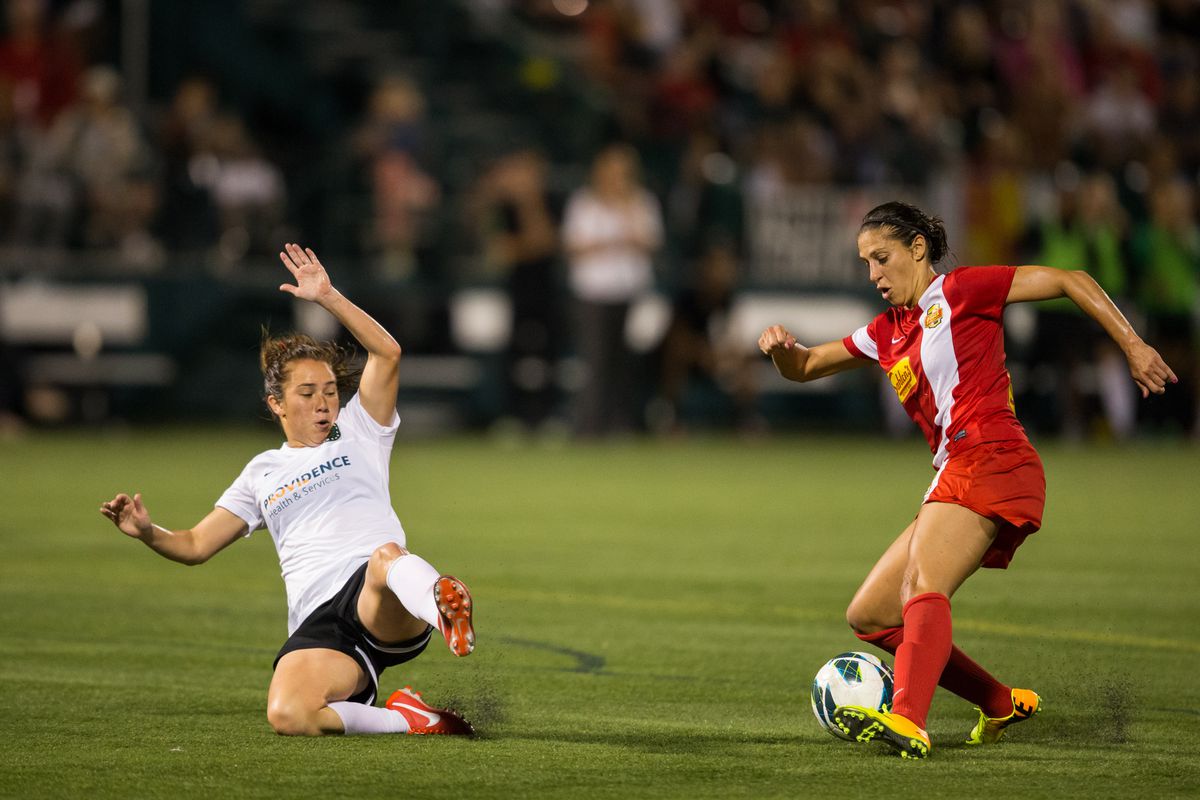 Flash midfielder Carli Lloyd (right) has helped spark a prolific WNY attack in 2014. 