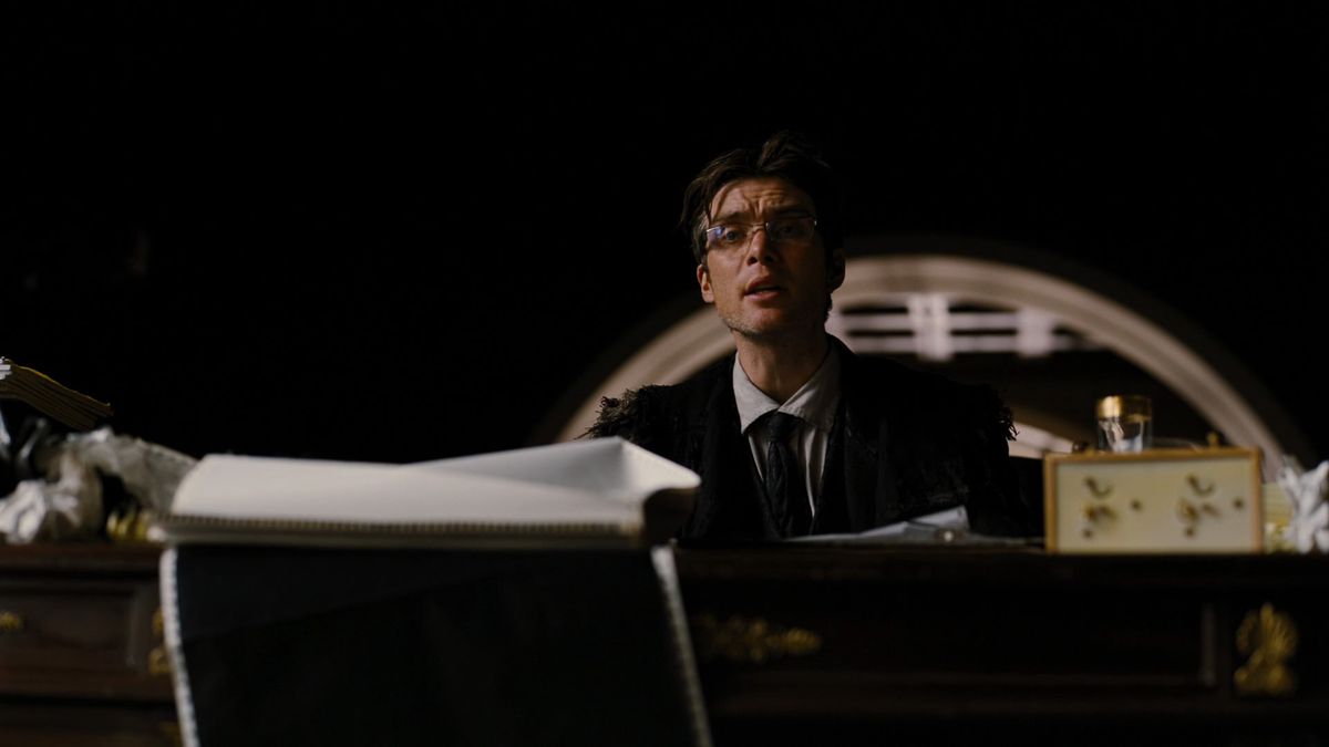 Cillian Murphy as a grizzled Jonathan Crane presiding over a makeshift court in The Dark Knight Rises