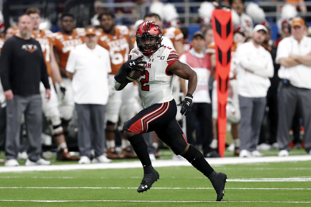 Zack Moss of the Utah Utes runs the ball in the second quarter against the Texas Longhorns during the Valero Alamo Bowl at the Alamodome on December 31, 2019 in San Antonio, Texas.