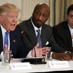 FILE - In this Thursday, Feb. 23, 2017, file photo, President Donald Trump, left, speaks during a meeting with manufacturing executives at the White House in Washington, including Merck CEO Kenneth Frazier, center, and Ford CEO Mark Fields. Frazier is resigning from the President’s American Manufacturing Council citing "a responsibility to take a stand against intolerance and extremism." Frazier's resignation comes shortly after a violent confrontation between white supremacists and protesters in Charlottesville, Va. Trump is being criticized for not explicitly condemning the white nationalists who marched in Charlottesville. (AP Photo/Evan Vucci, File)