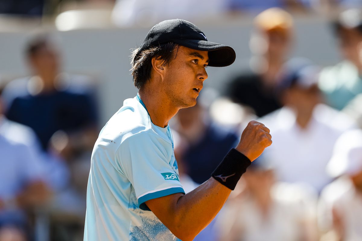 PARIS, FRANCE - MAY 31: Taro Daniel of Japan celebrates a point won against Carlos Alcaraz of Spain during their Singles First Round Match on Day Four of the 2023 French Open at Roland Garros on May 31, 2023 in Paris, France.