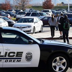 Students and parents leave Mountain View High School in Orem on Tuesday, Nov. 15, 2016, after five students were stabbed in an apparent attack by a 16-year-old boy.