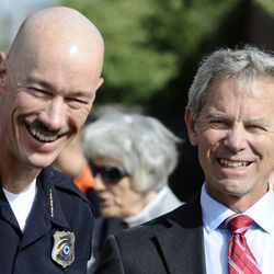 Salt Lake City Police Chief Chris Burbank and Mayor Ralph Becker have a laugh prior to a press conference on Monday, September 30, 2013.