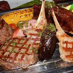 Newly opened CityCentre meat mecca Sal y Pimienta offers a parillada that includes a 40-day dry-aged Niman Ranch  Tomahawk (22- to 26-oz), Picanha (Niman Ranch), short ribs (Hereford Cattle), lamb chop, chicken breast,
Argentinean blood sausage, sweet br