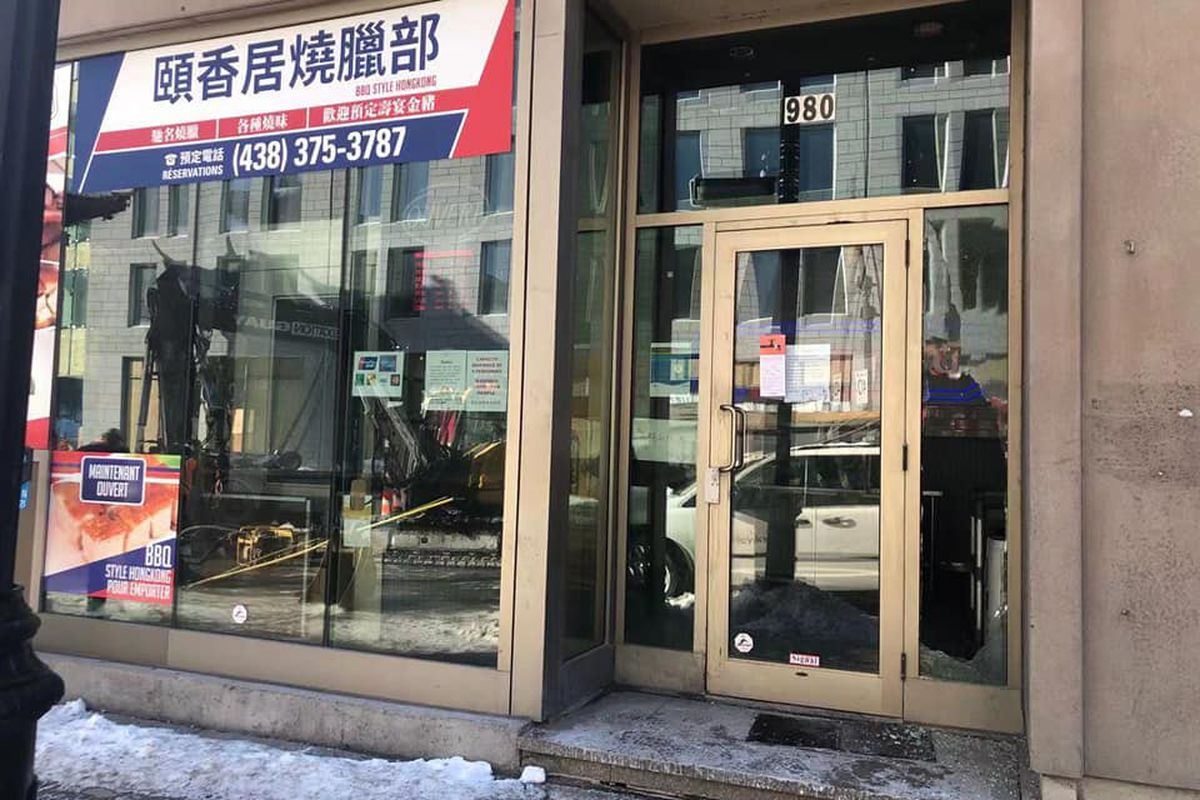 chinatown storefront with shattered window