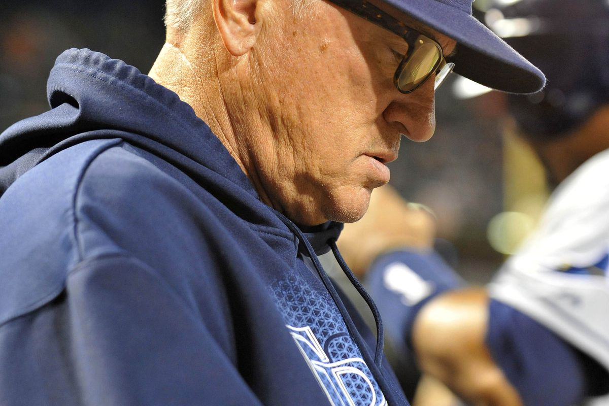 September 12, 2012; Baltimore, MD, USA; Tampa Bay Rays manager Joe Maddon (70) in the dugout during the third inning against the Baltimore Orioles at Oriole Park at Camden Yards. Mandatory Credit: Joy R. Absalon-US PRESSWIRE