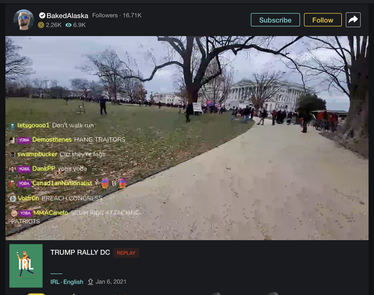 Screenshot of a video showing the lawn and walkway in front of the Capitol building, with viewers comments superimposed.