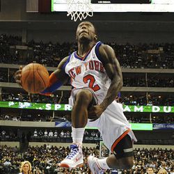 New York's Nate Robinson approaches the basket during the slam dunk contest on Saturday night.
