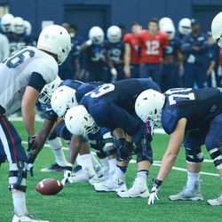 The UConn Huskies football team practices in the Shenkman Training Center in the Burton Family Football Complex on August 15, 2018.