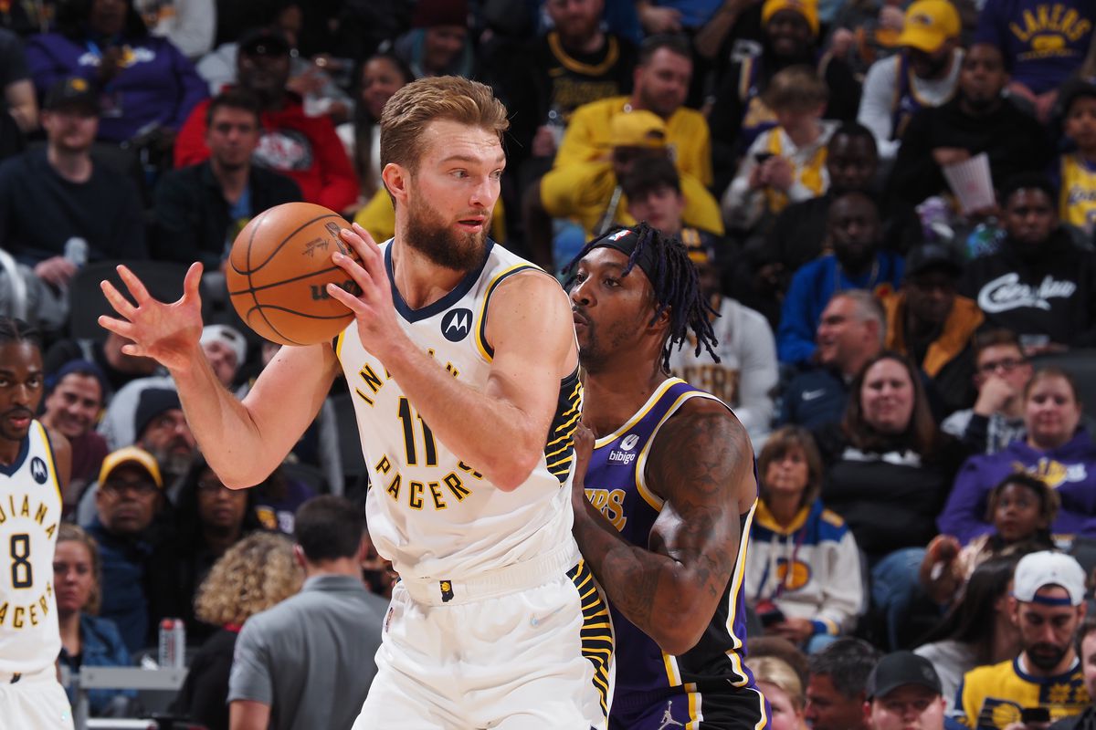 Domantas Sabonis #11 of the Indiana Pacers handles the ball against the Los Angeles Lakers on November 24, 2021 at Gainbridge Fieldhouse in Indianapolis, Indiana.