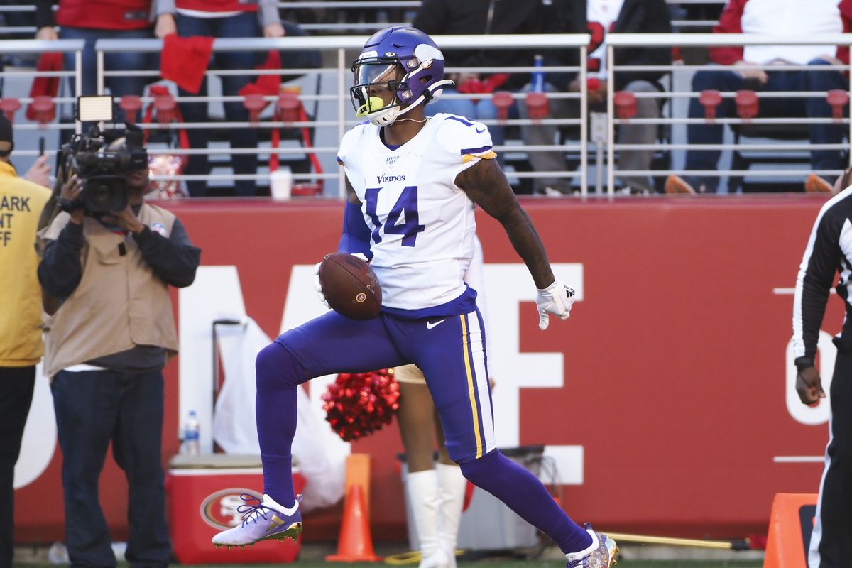 Minnesota Vikings wide receiver Stefon Diggs jogs backwards to score a touchdown against the San Francisco 49ers during the first quarter in a NFC Divisional Round playoff football game at Levi’s Stadium.