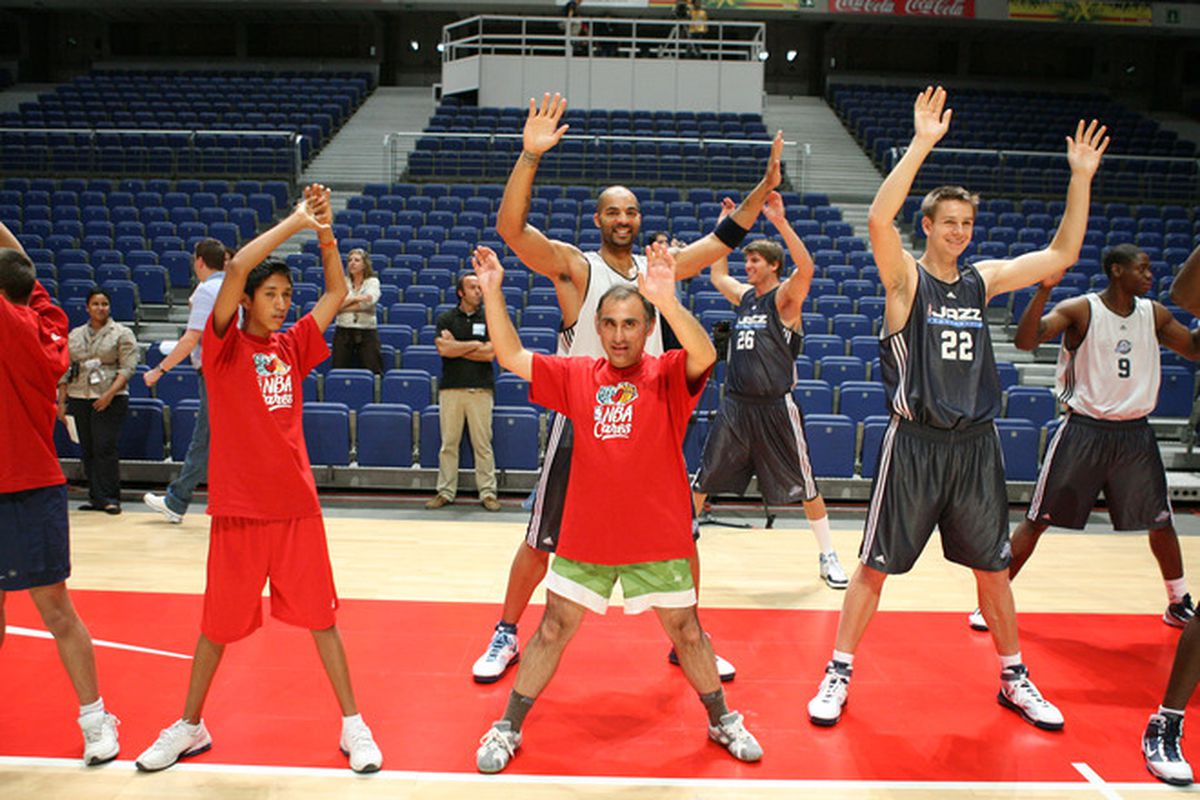The Jazz teach the locals a great American tradition, singing the YMCA.