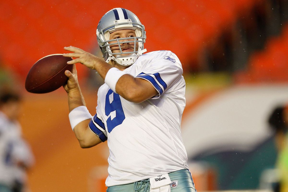 MIAMI GARDENS, FL - SEPTEMBER 01:  Tony Romo #9 of the Dallas Cowboys warms up during a Pre-Season NFL game against the Miami Dolphins at Sun Life Stadium on September 1, 2011 in Miami Gardens, Florida.  (Photo by Mike Ehrmann/Getty Images)