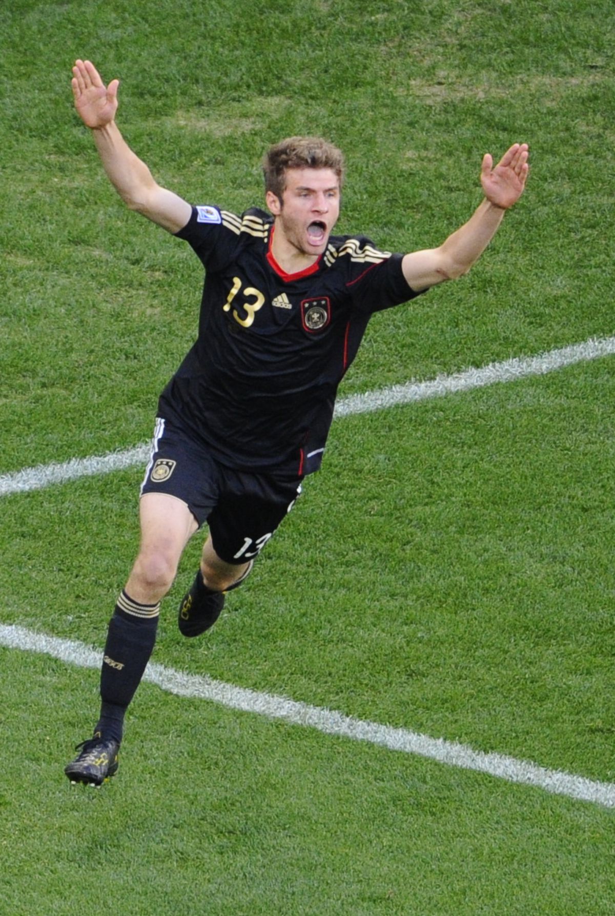 Germany’s midfielder Thomas Mueller cele