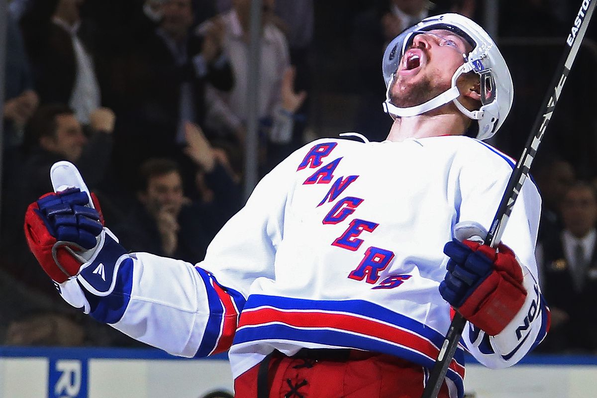 NEW YORK, NY - DECEMBER 08: Kevin Klein #8 of the New York Rangers celebrates his game winning goal at 3:45 of overtime against the Pittsburgh Penguins at Madison Square Garden on December 8, 2014 in New York City. The Rangers defeated the Penguins 4