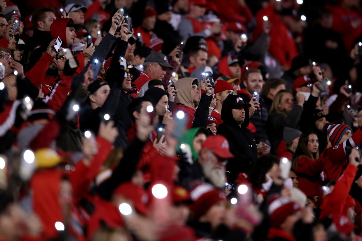 Utah fans hold their phone lights up