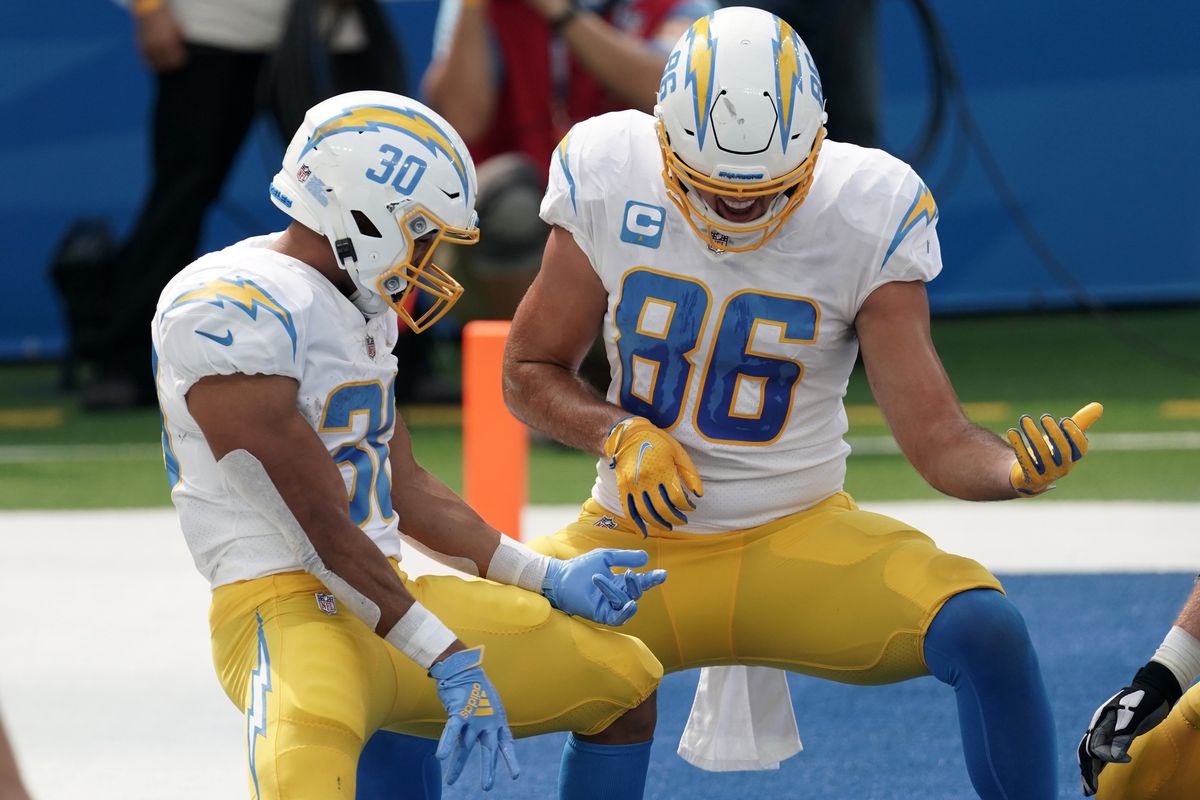 Los Angeles Chargers running back Austin Ekeler celebrates with tight end Hunter Henry after scoring a touchdown in the second quarter against the Carolina Panthers at SoFi Stadium.&nbsp;