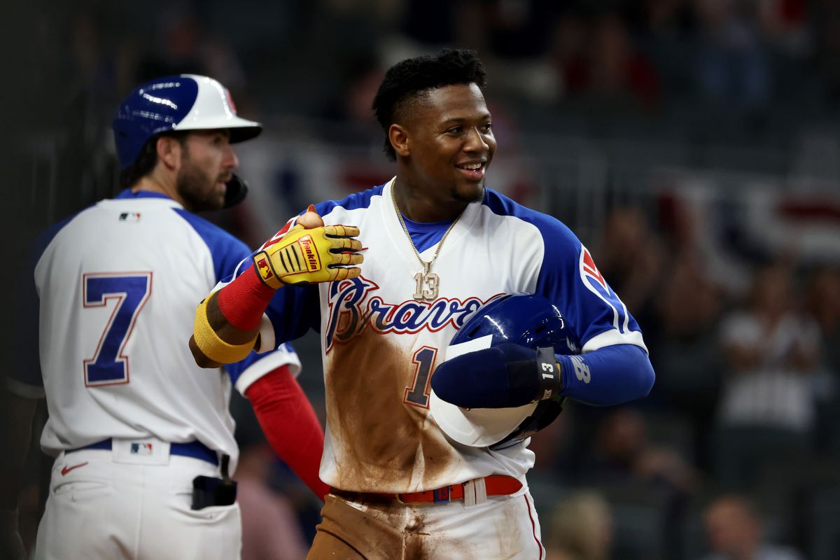 Atlanta Braves right fielder Ronald Acuna Jr. reacts after scoring a run against the Miami Marlins in the third inning at Truist Park.&nbsp;
