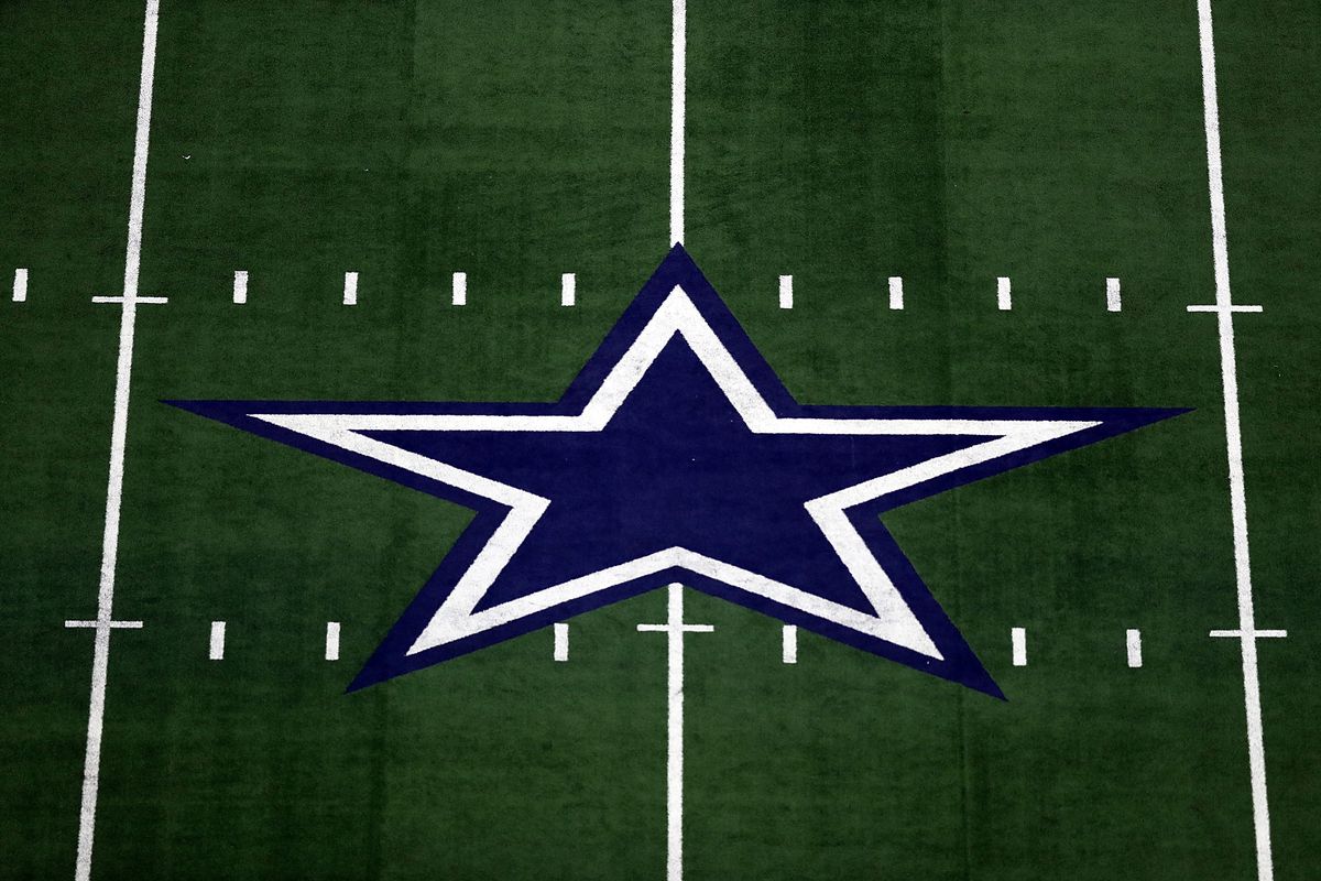 The Dallas Cowboys logo at AT&amp;T Stadium on September 30, 2018 in Arlington, Texas.