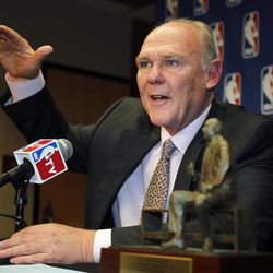 FILE - In this May 8, 2013 file photo, Denver Nuggets head coach George Karl makes a point to reporters during a news conference where he was named the NBA Coach of the Year, in Denver. Karl is out as coach of the Nuggets. Team President Josh Kroenke confirmed in an email to The Associated Press on Thursday, June 6, 2013 that Karl's tenure was over just weeks after he was named the NBA's coach of the year. 