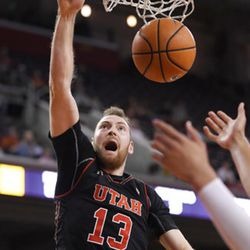 Utah forward David Collette dunks during the first half of an NCAA college basketball game against Southern California, Sunday, Jan. 14, 2018, in Los Angeles. (AP Photo/Mark J. Terrill)