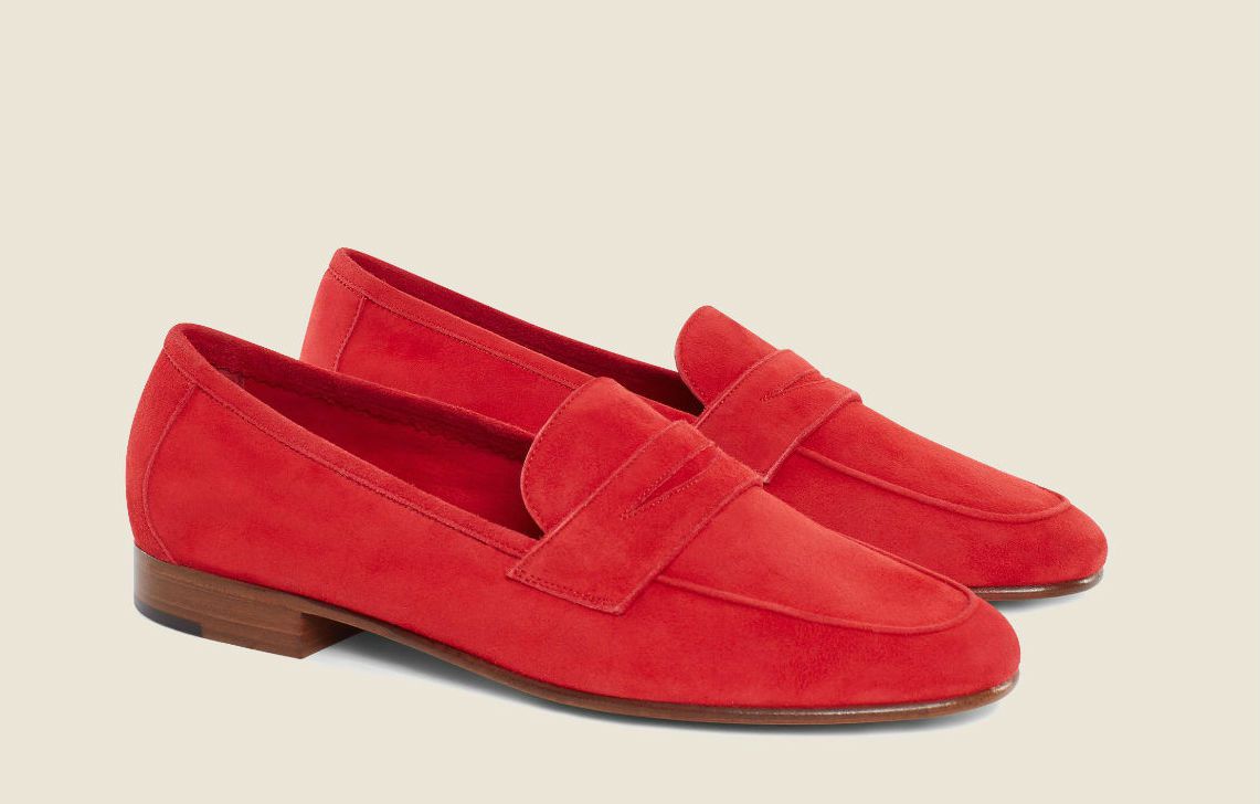 A pair of red suede loafers
