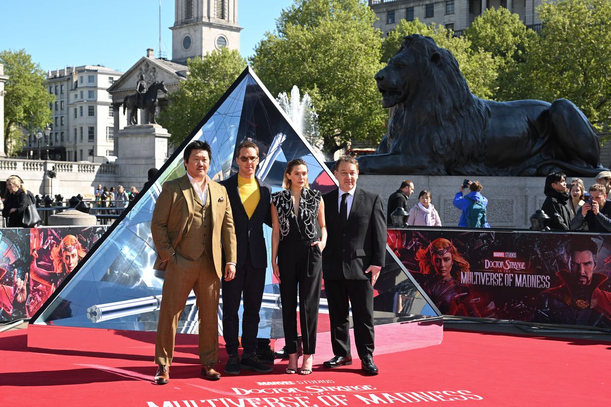 Benedict Wong, Benedict Cumberbatch, Elizabeth Olsen and Director Sam Raimi attend the “Doctor Strange In The Multiverse Of Madness” Photocall at Trafalgar Sq on April 26, 2022 in London, England.